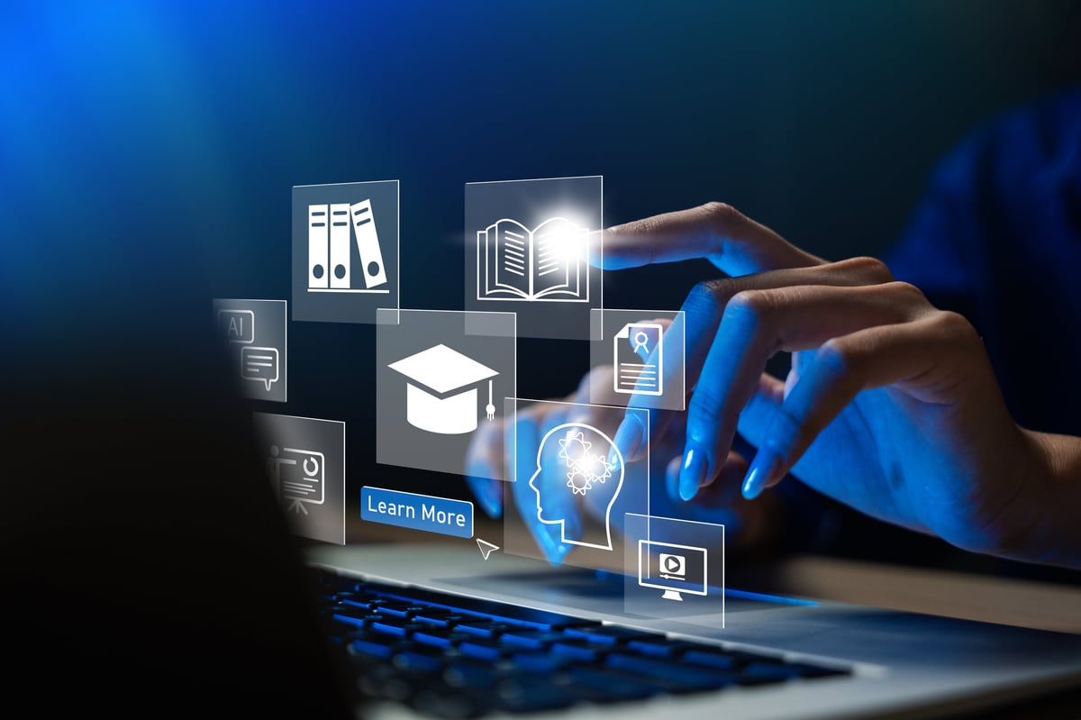 Professional taking an online business training course on a laptop